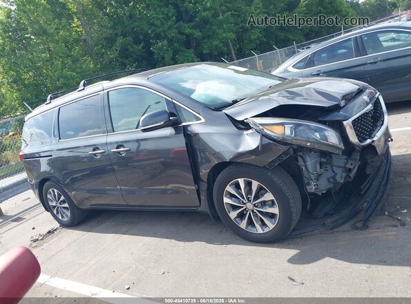 KNDMC5C12H6325803 2017 KIA SEDONA Gray Սալոնի հետևի տեսք