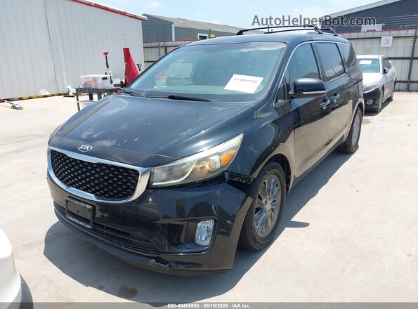 KNDMC5C18G6146972 2016 KIA SEDONA Черный Передняя левая четверть