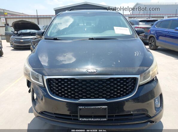 KNDMC5C18G6146972 2016 KIA SEDONA Черный Вид задней части салона