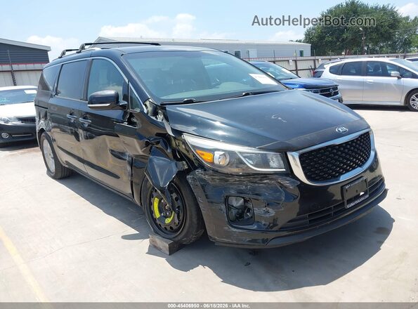 KNDMC5C18G6146972 2016 KIA SEDONA Черный Вид спереди