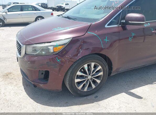 KNDMC5C1XG6147086 2016 KIA SEDONA Burgundy Widok z przodu