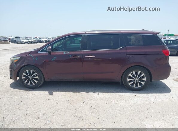 KNDMC5C1XG6147086 2016 KIA SEDONA Burgundy Widok wnętrza 360 stopni