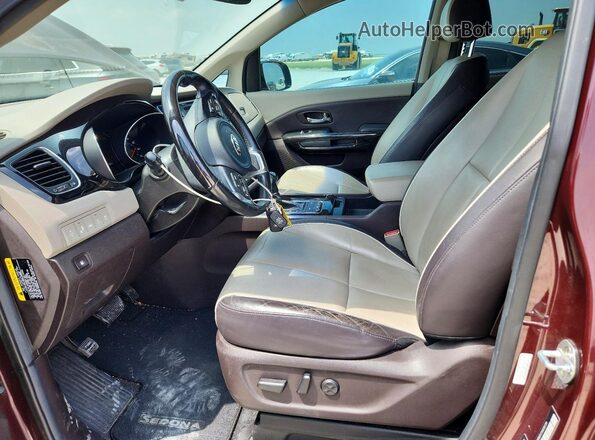 KNDME5C11G6186739 2016 KIA SEDONA Maroon Vista interior delantera