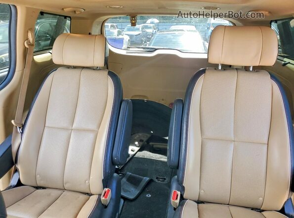 KNDME5C18H6334077 2017 KIA SEDONA Black უკანა სავარძლების ხედი