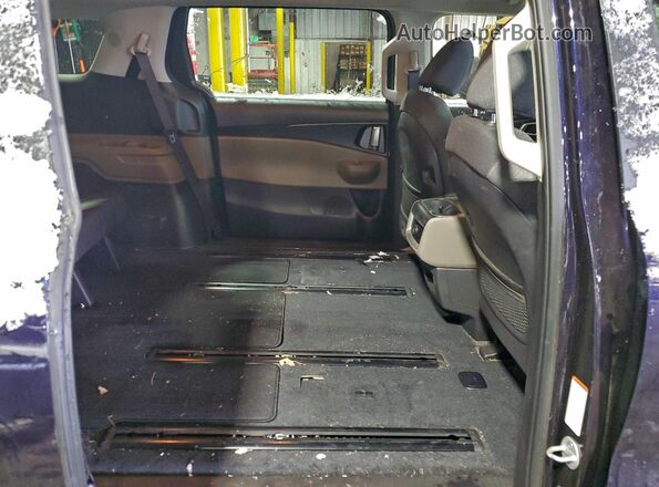 KNDNB5K34T6572629 2026 KIA CARNIVAL Blue Widok wnętrza z tyłu