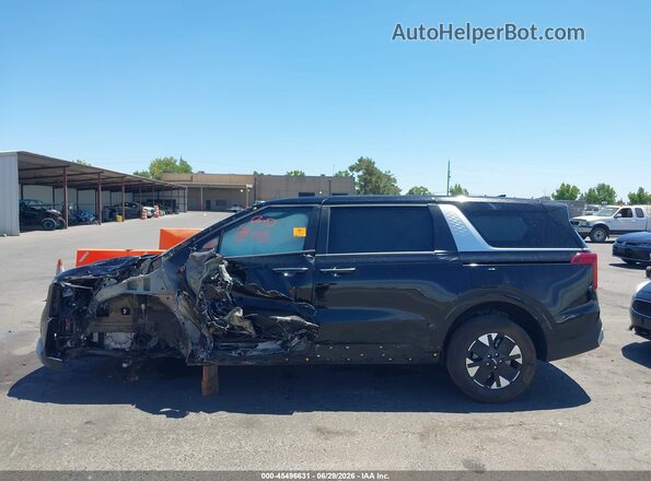 KNDNB5KA9T6129049 2026 KIA CARNIVAL MPV HYBRID Black Вид задньої частини салону