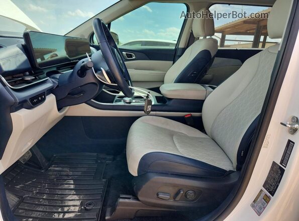 KNDNC5KA2S6061902 2025 KIA CARNIVAL Белый Вид салона спереди