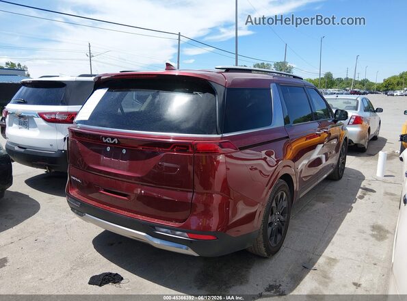KNDNE5H32P6204034 2023 KIA CARNIVAL MPV Burgundy Trasero derecho