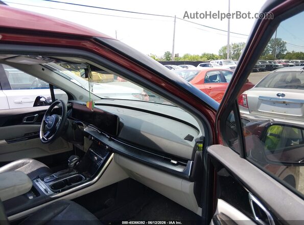 KNDNE5H32P6204034 2023 KIA CARNIVAL MPV Burgundy Vista interior delantera