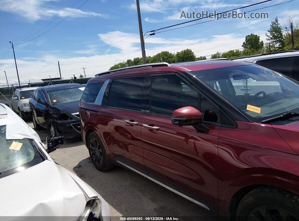 KNDNE5H32P6204034 2023 KIA CARNIVAL MPV Burgundy Vista interior trasera