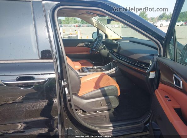 KNDNE5KA1S6048679 2025 KIA CARNIVAL MPV HYBRID Black Widok wnętrza z przodu