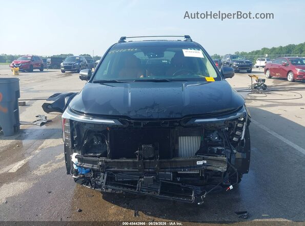 KNDNE5KA1S6048679 2025 KIA CARNIVAL MPV HYBRID Black Widok wnętrza z tyłu