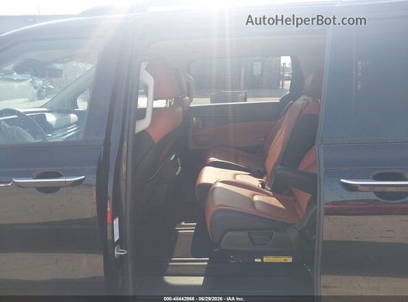KNDNE5KA1S6048679 2025 KIA CARNIVAL MPV HYBRID Black Widok naklejki z numerem VIN