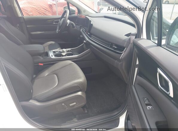 KNDNE5KA4T6109105 2026 KIA CARNIVAL MPV HYBRID White Widok wnętrza z przodu