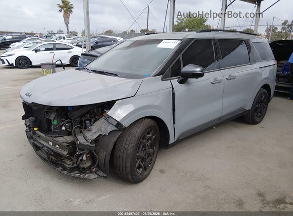 KNDNE5KA8T6139384 2026 KIA CARNIVAL MPV HYBRID Gray წინა მარცხენა ხედი სამი მეოთხედიდან