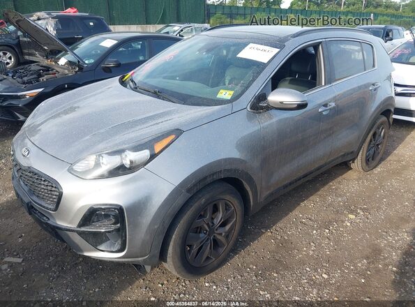KNDP6CAC5M7912658 2021 KIA SPORTAGE Серебряный Передняя левая четверть