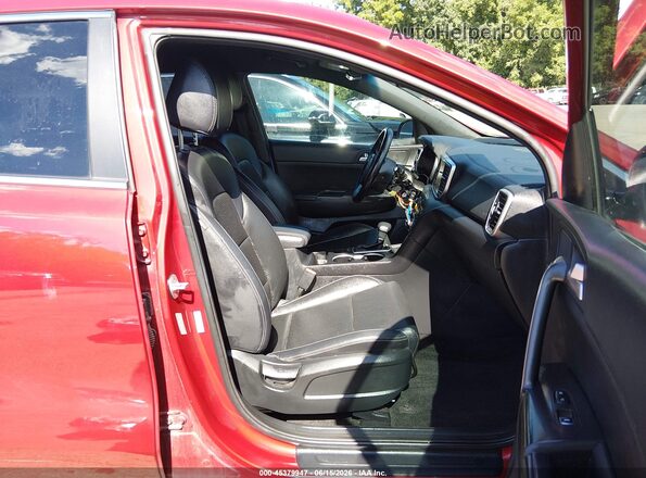 KNDP6CACXM7844485 2021 KIA SPORTAGE Red Widok wnętrza z przodu