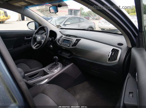 KNDPBCAC1G7811682 2016 KIA SPORTAGE Blue Widok wnętrza z przodu
