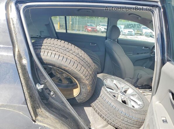 KNDPBCAC4G7806248 2016 KIA SPORTAGE Black Widok wnętrza z tyłu