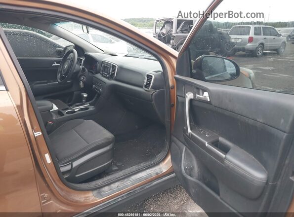 KNDPM3AC2K7593206 2019 KIA SPORTAGE Brown Front interior view