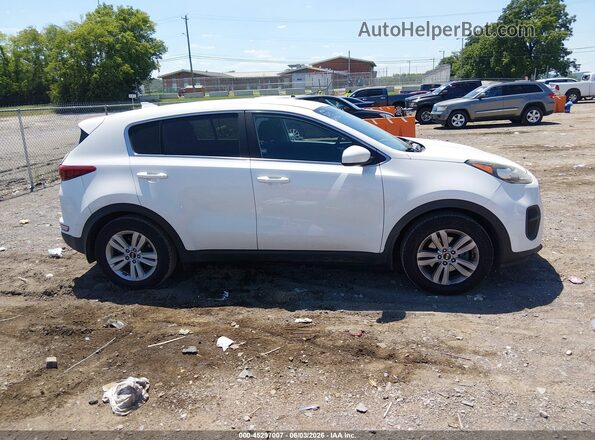 KNDPM3AC6K7543697 2019 KIA SPORTAGE White Սալոնի հետևի տեսք
