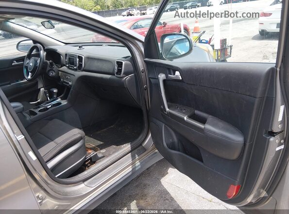 KNDPM3AC9J7360082 2018 KIA SPORTAGE Silver წინა სალონის ხედი