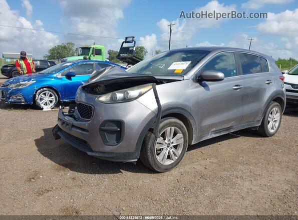 KNDPM3AC9K7561563 2019 KIA SPORTAGE Gray წინა მარცხენა ხედი სამი მეოთხედიდან