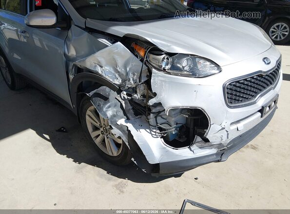 KNDPM3ACXK7504336 2019 KIA SPORTAGE Серебряный Вид спереди