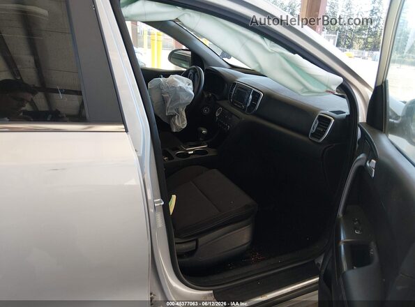 KNDPM3ACXK7504336 2019 KIA SPORTAGE Серебряный Вид салона спереди