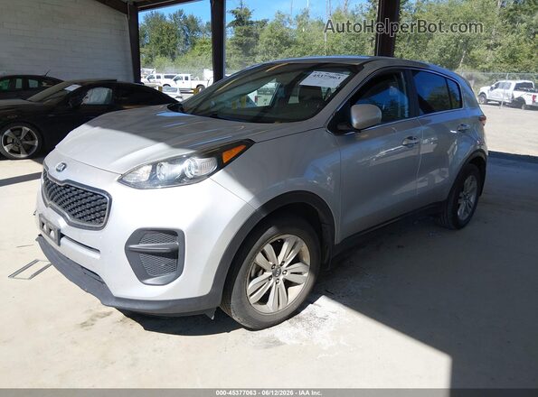 KNDPM3ACXK7504336 2019 KIA SPORTAGE Серебряный Передняя левая четверть