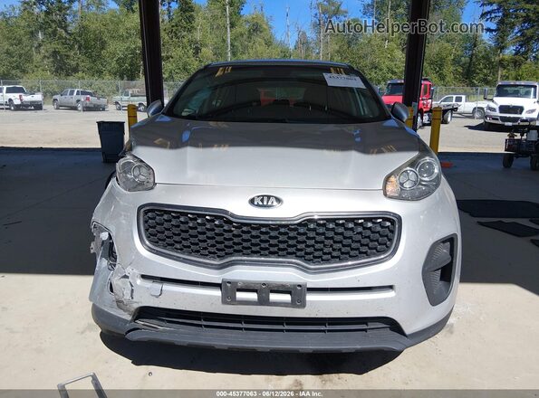 KNDPM3ACXK7504336 2019 KIA SPORTAGE Серебряный Вид панели приборов