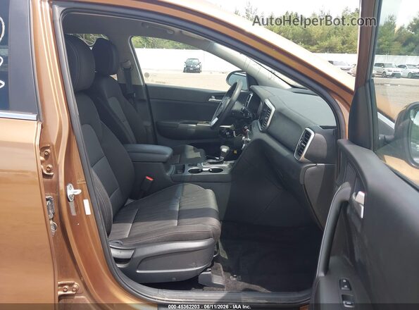 KNDPMCAC0M7886458 2021 KIA SPORTAGE Brown Вид салону спереду