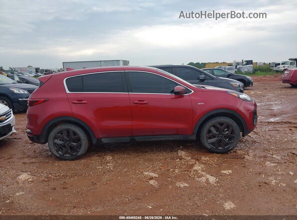 KNDPMCAC3N7001834 2022 KIA SPORTAGE Red Widok wnętrza z tyłu