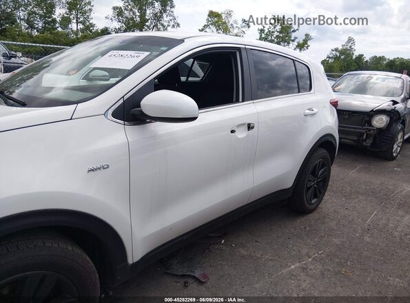KNDPMCAC4K7565794 2019 KIA SPORTAGE White Vista interior trasera