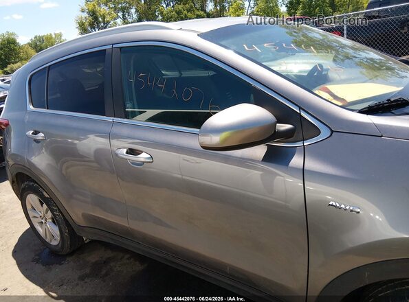 KNDPMCAC5H7235977 2017 KIA SPORTAGE Silver Սալոնի հետևի տեսք