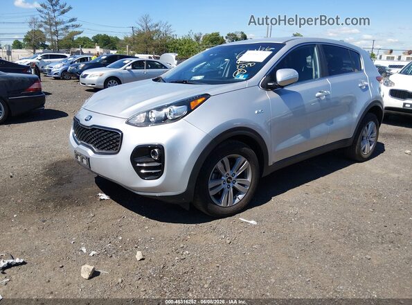 KNDPMCAC5K7507063 2019 KIA SPORTAGE Серебряный Передняя левая четверть