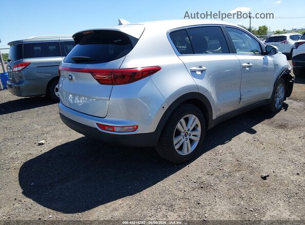 KNDPMCAC5K7507063 2019 KIA SPORTAGE Серебряный Задняя правая четверть