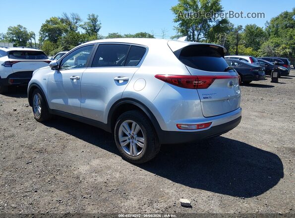 KNDPMCAC5K7507063 2019 KIA SPORTAGE Серебряный Задняя левая четверть