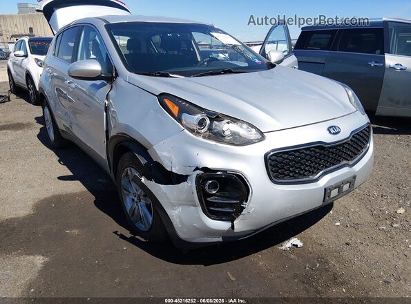 KNDPMCAC5K7507063 2019 KIA SPORTAGE Серебряный Вид спереди