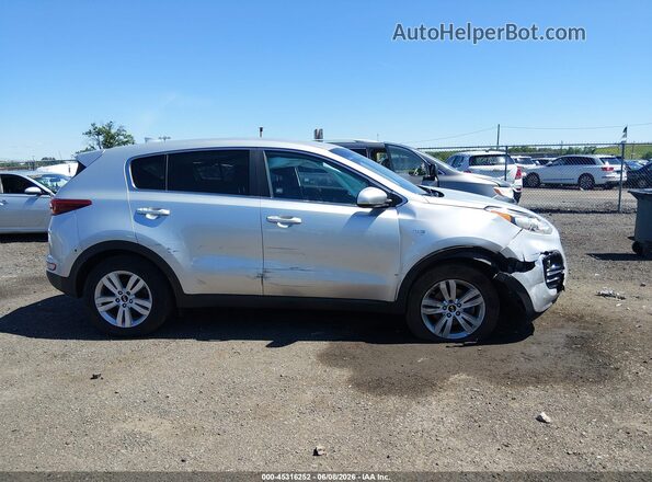 KNDPMCAC5K7507063 2019 KIA SPORTAGE Серебряный Вид задней части салона