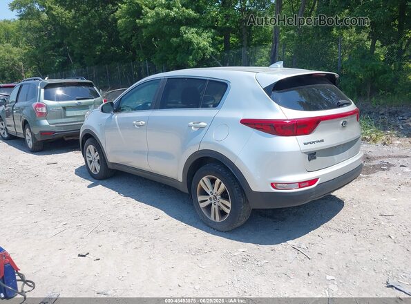 KNDPMCAC5K7579820 2019 KIA SPORTAGE Серебряный Задняя левая четверть