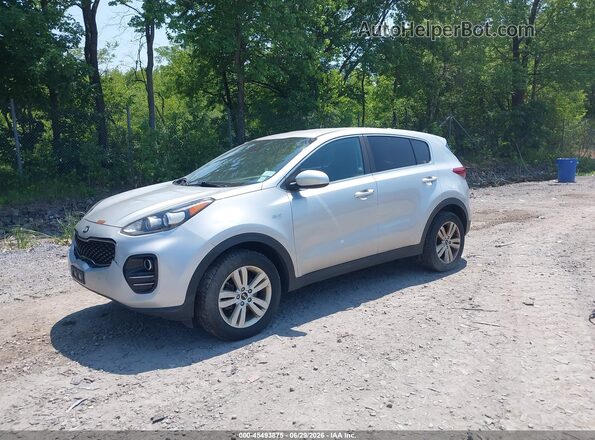 KNDPMCAC5K7579820 2019 KIA SPORTAGE Серебряный Передняя левая четверть