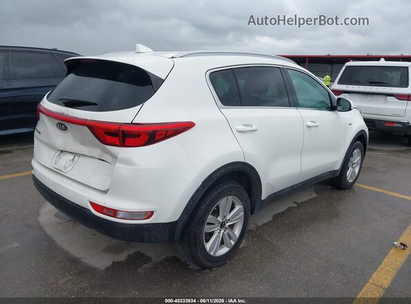 KNDPMCAC7K7605477 2019 KIA SPORTAGE White Trasero derecho