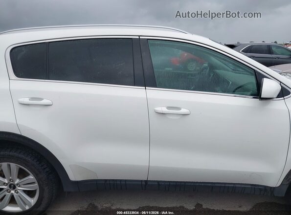 KNDPMCAC7K7605477 2019 KIA SPORTAGE White Vista interior trasera