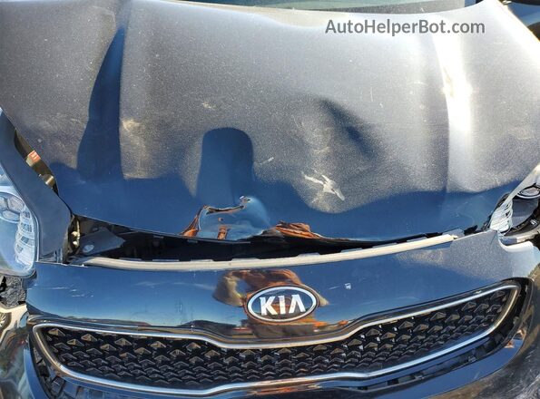 KNDPMCAC8K7502973 2019 KIA SPORTAGE Black Vista interior trasera