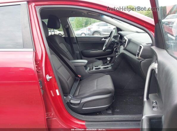 KNDPMCAC8L7749766 2020 KIA SPORTAGE Red Widok wnętrza z przodu