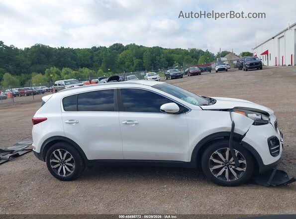KNDPN3AC7K7543978 2019 KIA SPORTAGE White Vista interior trasera