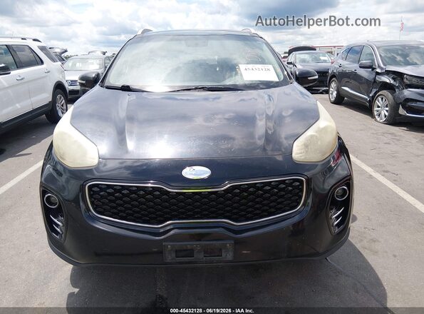KNDPNCAC6H7204119 2017 KIA SPORTAGE Black Widok wnętrza z tyłu