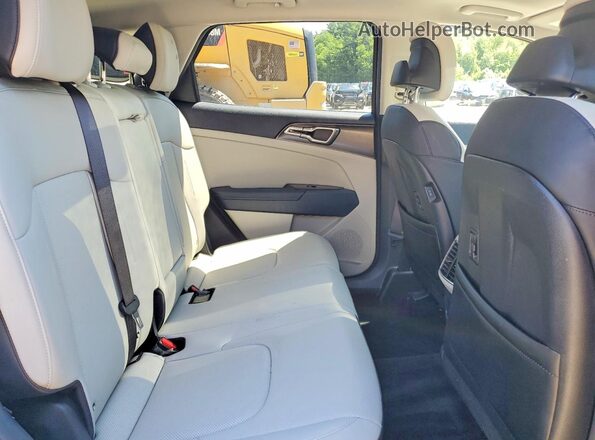 KNDPVCAG6P7025385 2023 KIA SPORTAGE Blue Vista interior trasera