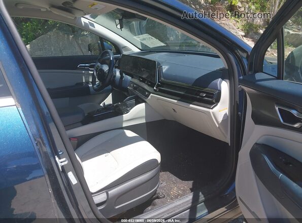 KNDPVCDGXS7195432 2025 KIA SPORTAGE HYBRID Dark Blue Вид салона спереди